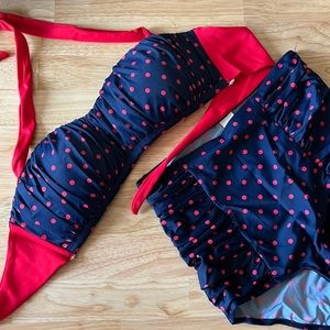 Retro style navy blue bikini with red polka dots
